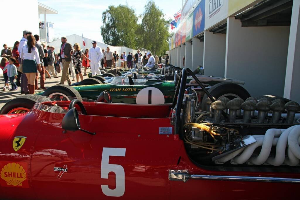 Goodwood Festival of Speed event with classic racing cars and luxury chauffeur service