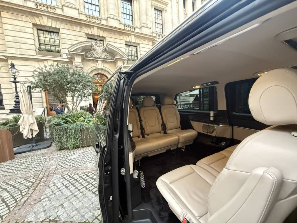 Cream leather passenger seats inside a Mercedes V-Class