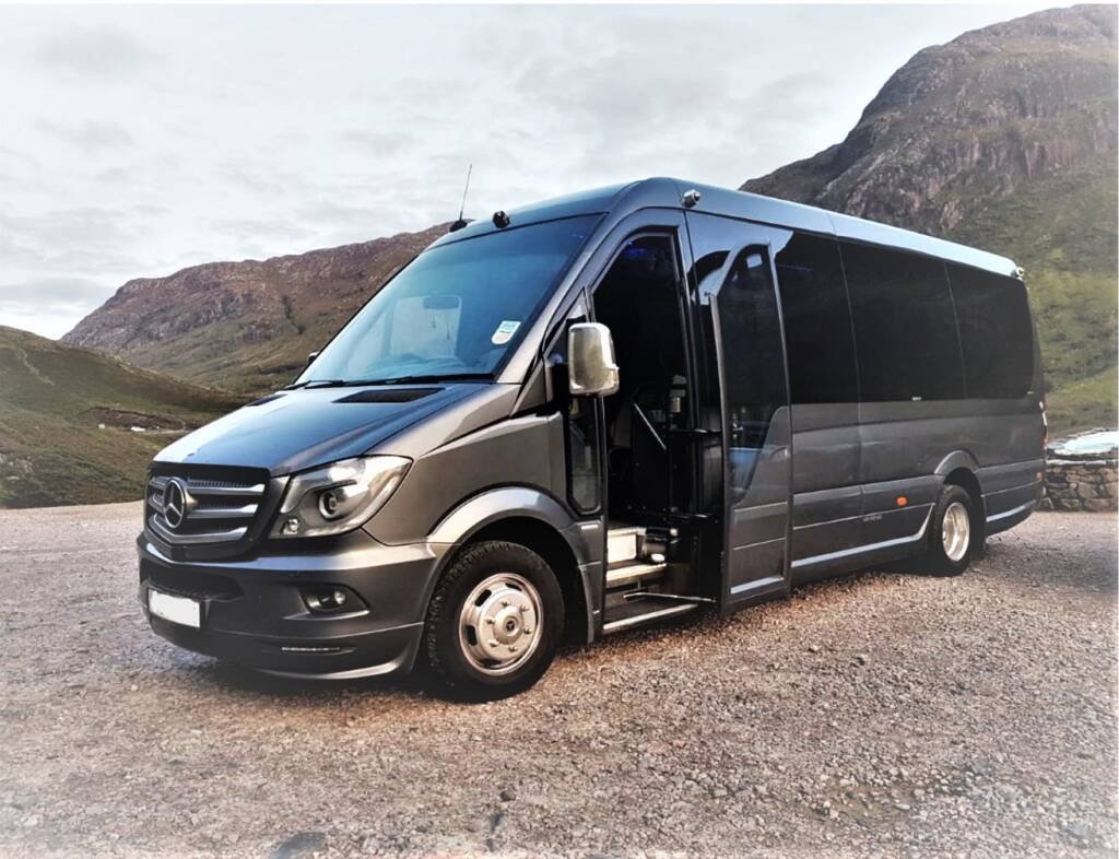 Mercedes sprinter executive minibus parked outdoors
