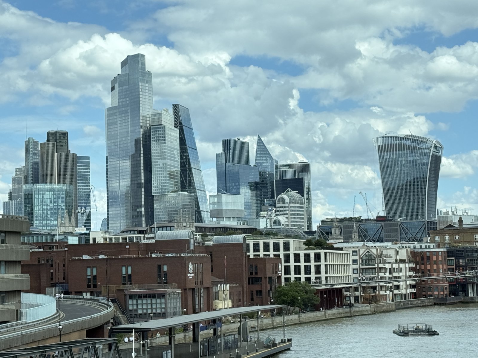 City of London skyline with modern skyscrapers overlooking the River Thames.